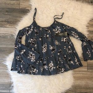 Cold shoulder peplum top